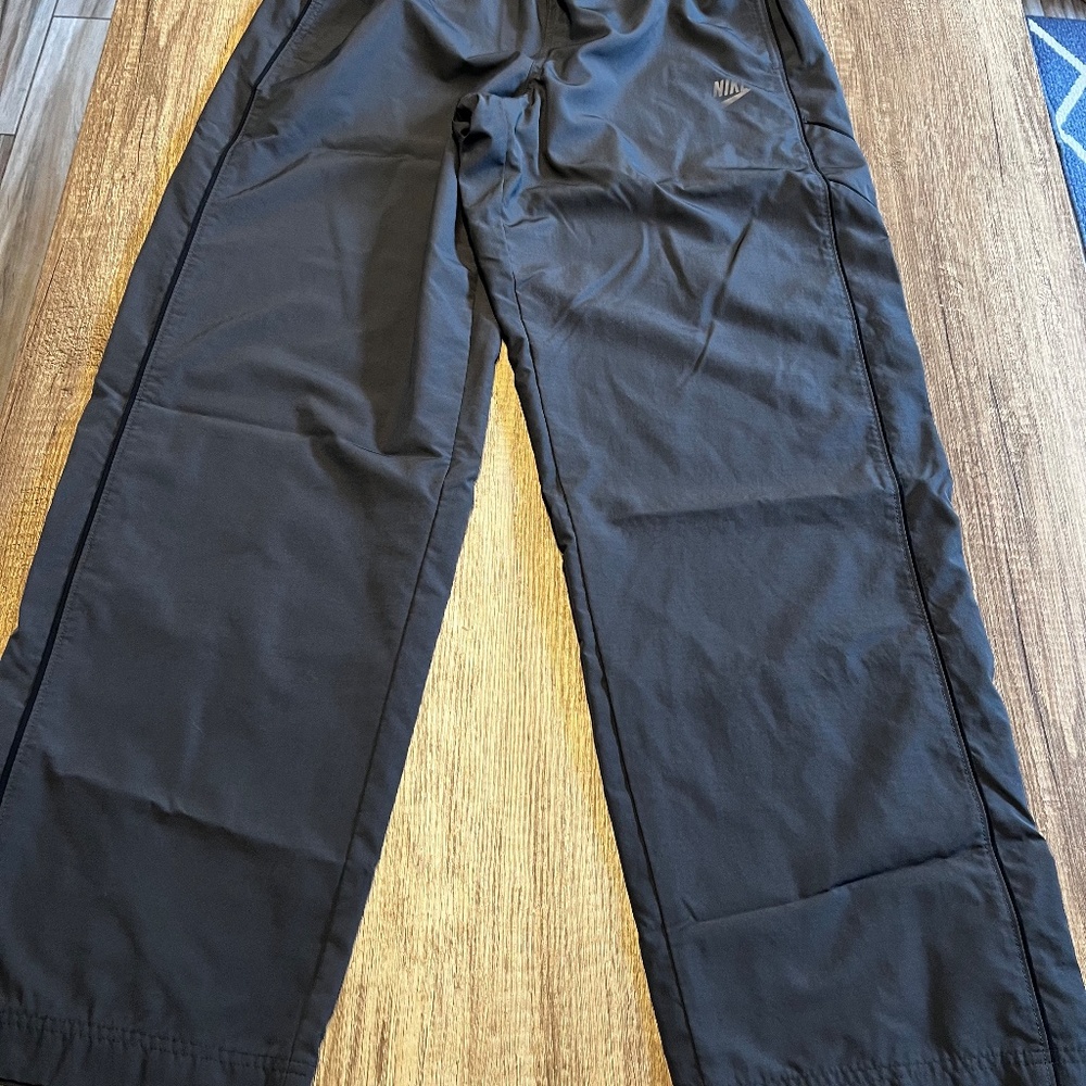Nike sportswear pants, black with 2 front pockets and one back pocket